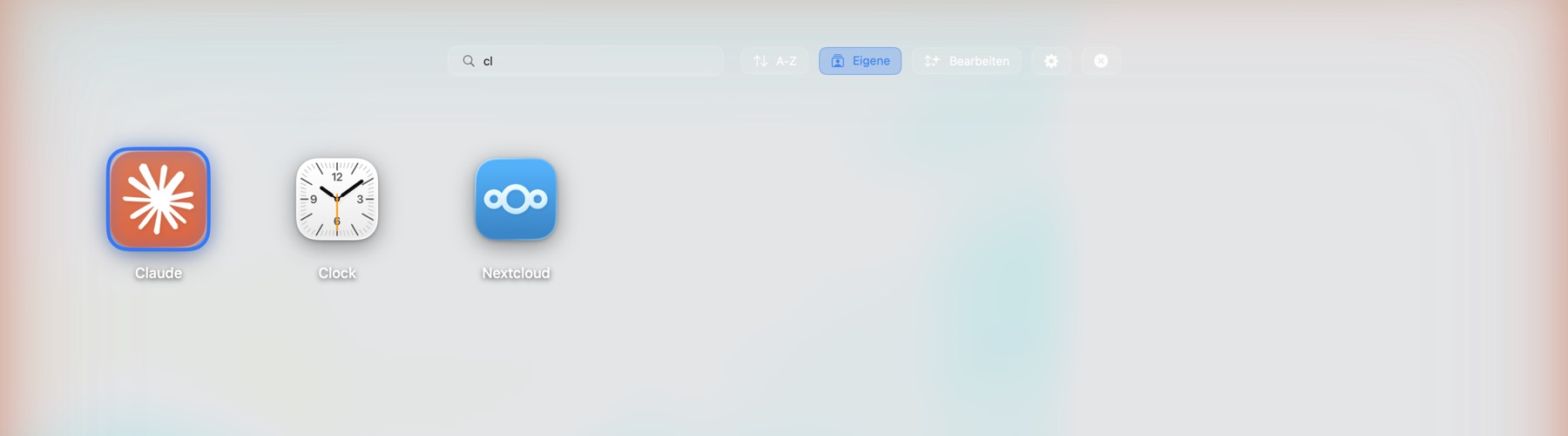 LaunchSprint Suche: die Eingabe „cl" filtert das Grid sofort auf Claude, Clock und Nextcloud